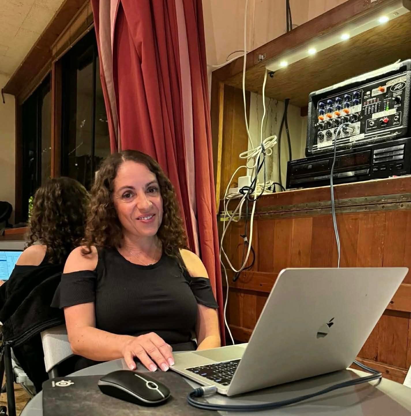 DJ Ella in the studio preparing a set